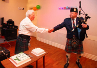 Bagpiper at a 80th Birthday Party